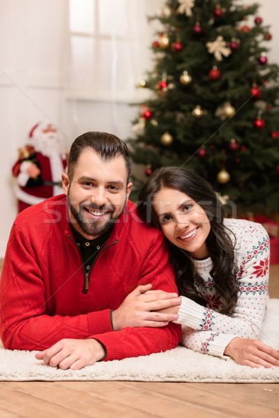 happy couple at christmastime Stock photo © LightFieldStudios
