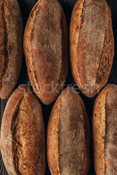 top view of freshly baked arranged loafs of bread Stock photo © LightFieldStudios