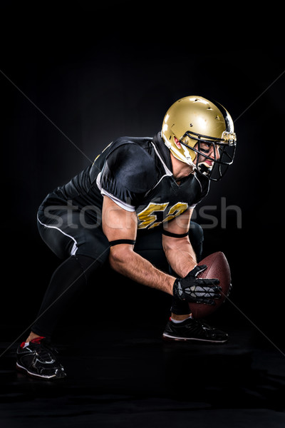 American football player crouching Stock photo © LightFieldStudios