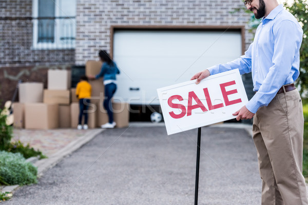 realtor with sale signboard Stock photo © LightFieldStudios