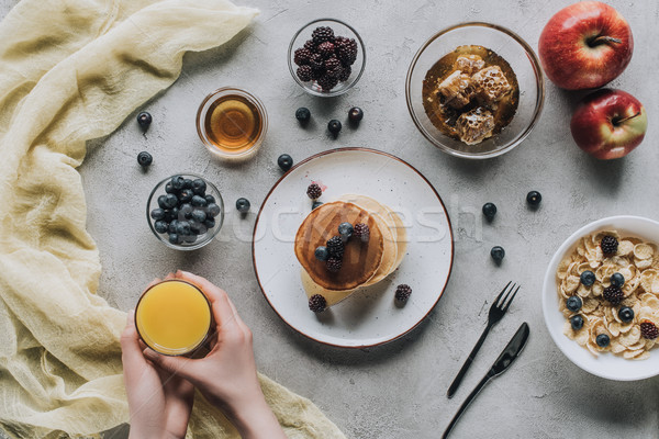 Top view persona mangiare sano colazione fatto in casa Foto d'archivio © LightFieldStudios