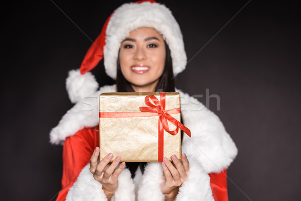 Stockfoto: Vrouw · kostuum · tonen · aanwezig · glimlachend