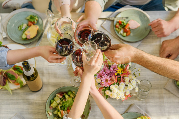 family clinking glasses Stock photo © LightFieldStudios