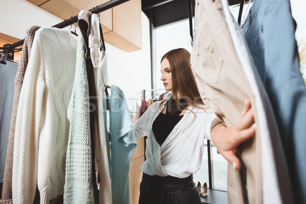 Lány választ ruházat butik gyönyörű divatos Stock fotó © LightFieldStudios