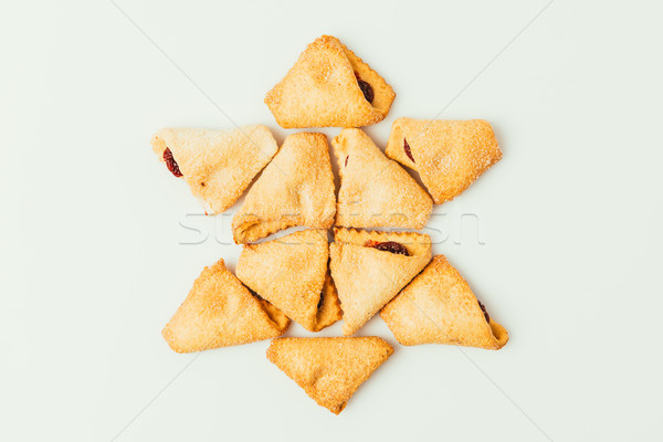 top view of star made of cookies isolated on grey, purim holiday concept Stock photo © LightFieldStudios
