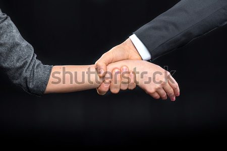 Man grabbing hand of woman Stock photo © LightFieldStudios