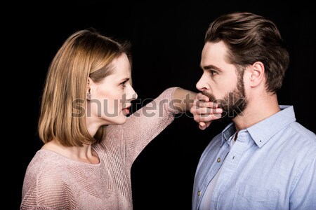 Woman asking man for quiet Stock photo © LightFieldStudios