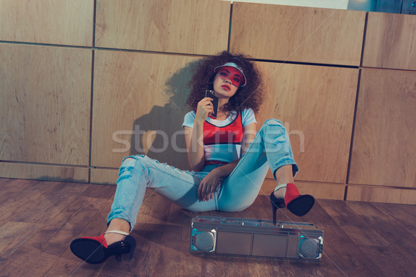 fashionable woman with hip flask Stock photo © LightFieldStudios