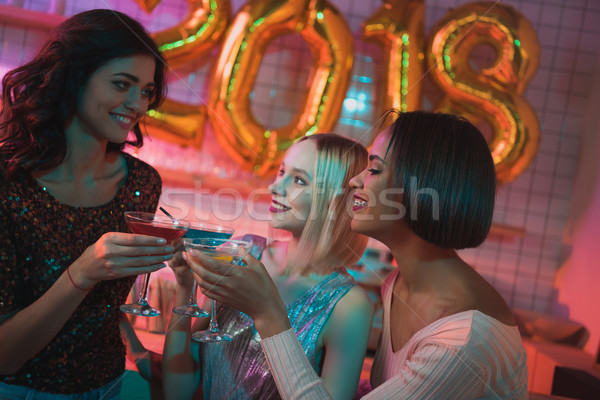 Multicultural mulheres cocktails retrato óculos ano novo Foto stock © LightFieldStudios