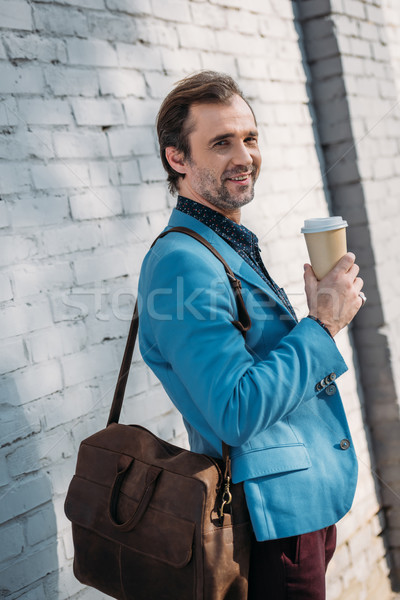 stylish man with coffee to go Stock photo © LightFieldStudios