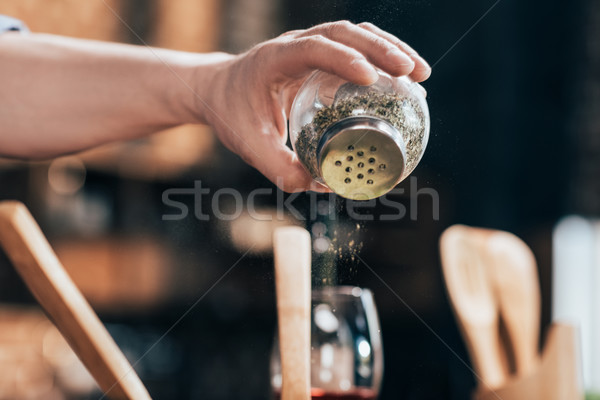 Stock photo: adding spices 