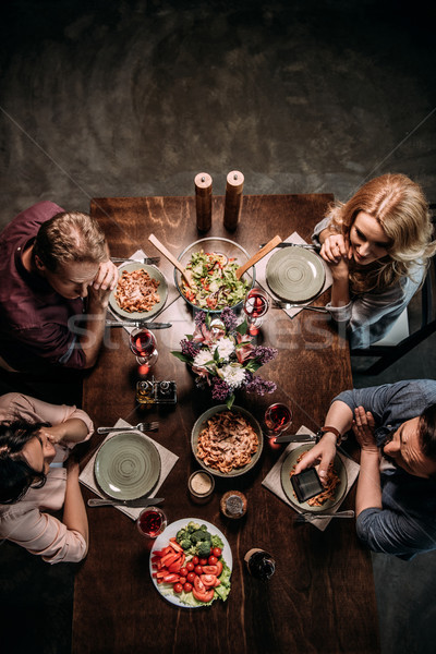 Amici cena view maturo coppie insieme Foto d'archivio © LightFieldStudios