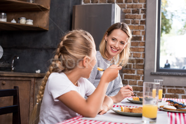 family having lunch together Stock photo © LightFieldStudios