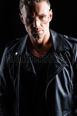 Handsome man holding cup of coffee Stock photo © LightFieldStudios