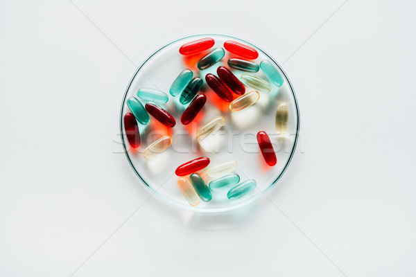 colorful pills in petri dish Stock photo © LightFieldStudios
