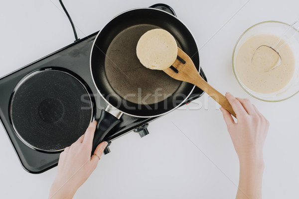 Top Ansicht Person Kochen Pfannkuchen Pfanne Stock foto © LightFieldStudios