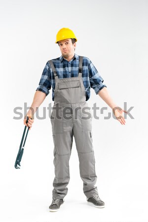 Workman with level tool Stock photo © LightFieldStudios