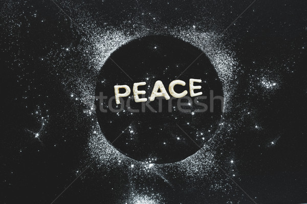Top view of edible word peace made from sweet crunchy cookies, baking cookies concept Stock photo © LightFieldStudios