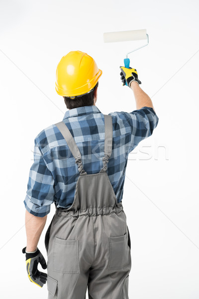 Workman with paint roller  Stock photo © LightFieldStudios