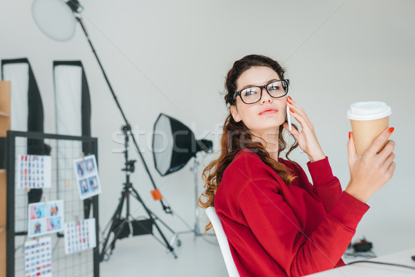 Designer smartphone bureau Homme travail parler [[stock_photo]] © LightFieldStudios