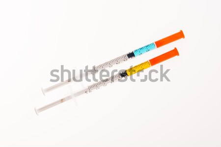 Insulin syringes for diabetes isolated on white, medicine and health care concept  Stock photo © LightFieldStudios