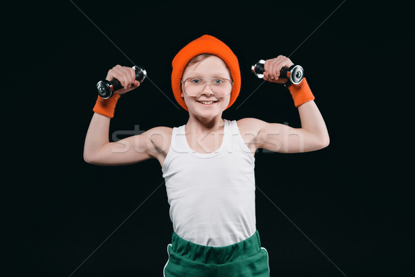 Stock photo: Boy Training With Dumbbells Isolated On Black Athletics Children Concept