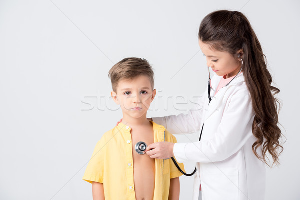 Bambini giocare medico paziente cute piccolo stetoscopio Foto d'archivio © LightFieldStudios