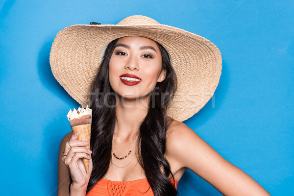 Stock photo: asian woman holding ice-cream