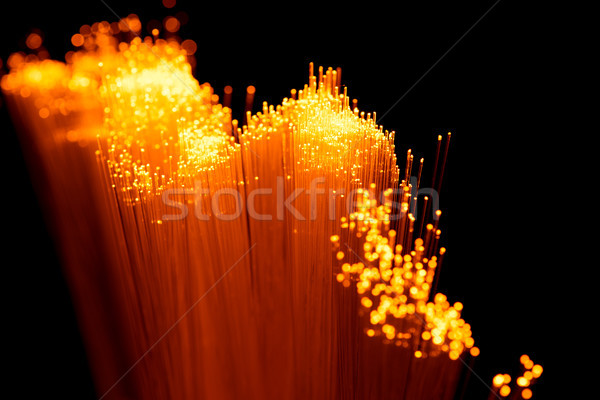 Close up of glowing orange fiber optics texture Stock photo © LightFieldStudios