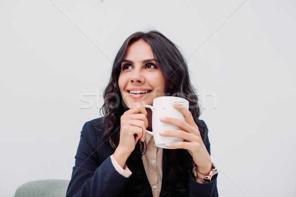 Empresária copo bebida quente feliz jovem negócio Foto stock © LightFieldStudios
