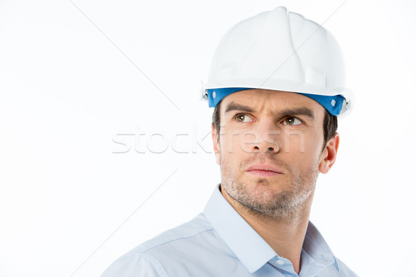Male architect in hard hat Stock photo © LightFieldStudios