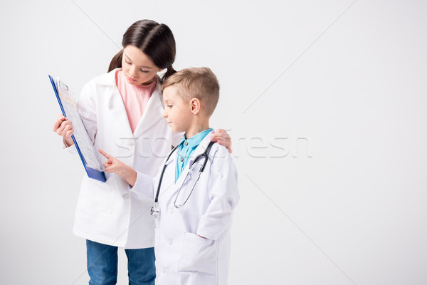 [[stock_photo]]: Enfants · jouant · médecins · peu · garçon · fille · médecin