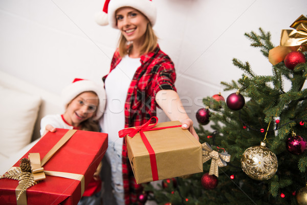 Stock photo: mother and daughter with christmas presents