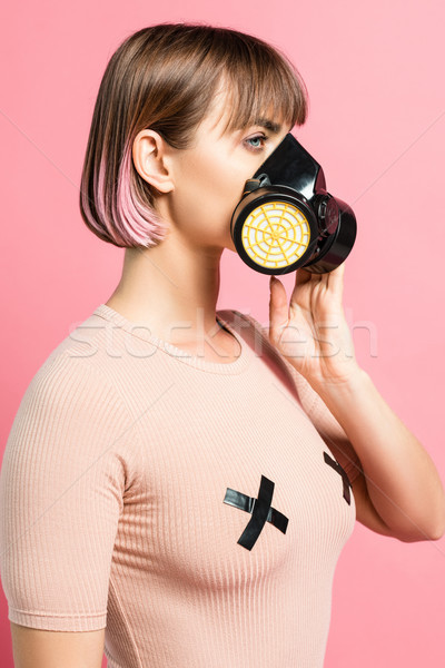 Fashionable woman with respirator Stock photo © LightFieldStudios