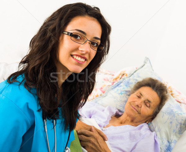 Enfermeira mais velho sorridente paciente casa de repouso Foto stock © Lighthunter