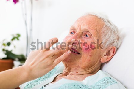 Crying elderly woman Stock photo © Lighthunter