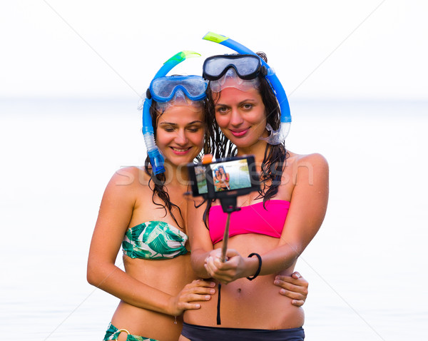 Idő snorkeling boldog fiatal nő okostelefon elvesz Stock fotó © Lighthunter