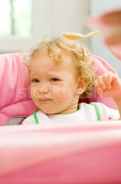 Bébé assez manger épinards cute peu Photo stock © Lighthunter
