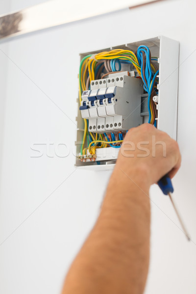 Electrician Man Fixing Fuse Stock photo © Lighthunter