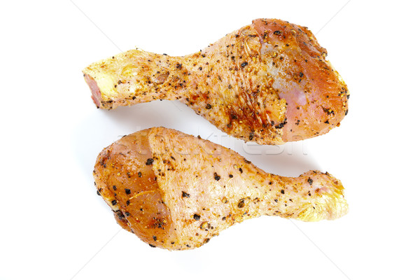 Marinated chicken legs isolated on white Stock photo © Lighthunter