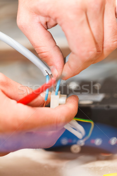Villanyszerelő megjavít eszközök javít elektromos kellékek Stock fotó © Lighthunter