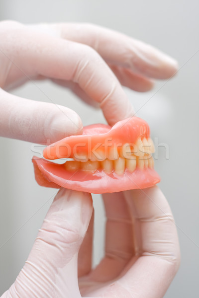 [[stock_photo]]: Artificielle · dents · médecin · main · travaux