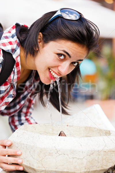 Woman Drinking from Spring Stock photo © Lighthunter