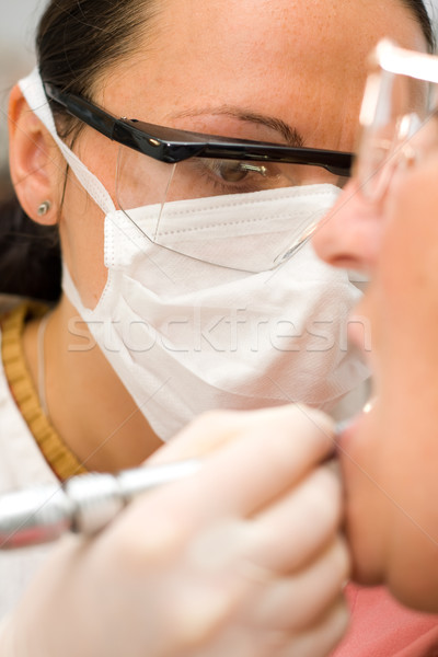 Dentist at work Stock photo © Lighthunter