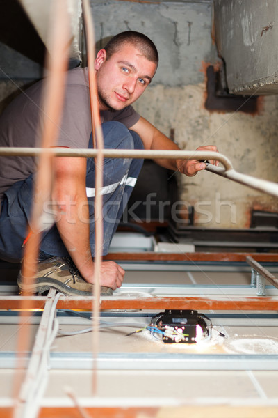 Elettricista uomo lavoro fili luci casa Foto d'archivio © Lighthunter