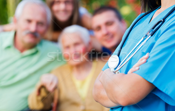 Gondoskodó emberek orvos sztetoszkóp boldog család orvosi ellátás Stock fotó © Lighthunter
