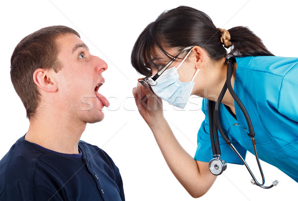 Garganta mulher médico masculino médico azul Foto stock © Lighthunter