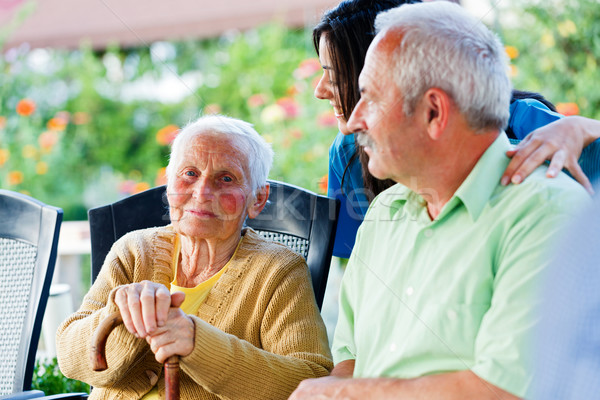 Kind Elderly Lady with Visitors Stock photo © Lighthunter