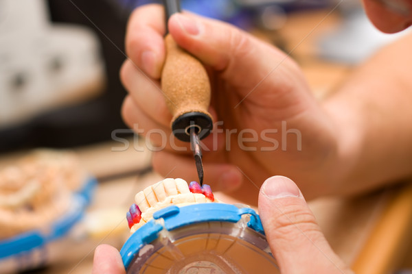 Remodeling of teeth of wax Stock photo © Lighthunter