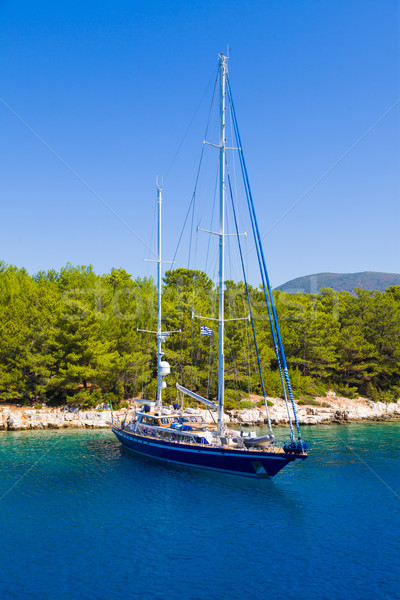 Shored boat in the mediterranean sea in a sunny day. Stock photo © Lighthunter
